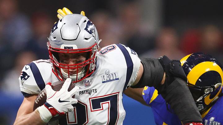 Feb 3, 2019; Atlanta, GA, USA; New England Patriots tight end Rob Gronkowski (87) runs after a reception against Los Angeles Rams linebacker Samson Ebukam (50) in Super Bowl LIII at Mercedes-Benz Stadium. Feb 3, 2019; Atlanta, GA, USA; New England Patriots tight end Rob Gronkowski (87) runs after a reception against Los Angeles Rams linebacker Samson Ebukam (50) in Super Bowl LIII at Mercedes-Benz Stadium.