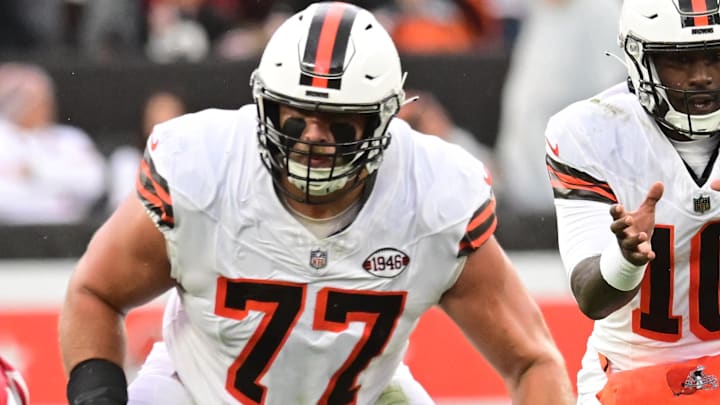Oct 15, 2023; Cleveland, Ohio, USA; Cleveland Browns quarterback PJ Walker (10) takes the snap behind guard Wyatt Teller (77) during the first half against the San Francisco 49ers at Cleveland Browns Stadium. Mandatory Credit: Ken Blaze-Imagn Images