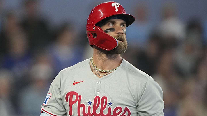 Jun 5, 2025; Toronto, Ontario, CAN; Philadelphia Phillies first baseman Bryce Harper (3) looks up at the scoreboard after striking out against the Toronto Blue Jays during the eighth inning at Rogers Centre Jun 5, 2025; Toronto, Ontario, CAN; Philadelphia Phillies first baseman Bryce Harper (3) looks up at the scoreboard after striking out against the Toronto Blue Jays during the eighth inning at Rogers Centre