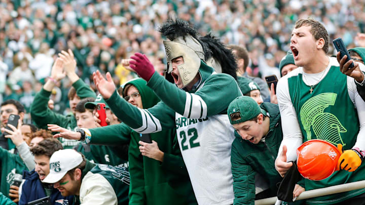 Michigan State fans celebrate their 37-33 win over Michigan at Spartan Stadium in East Lansing on Saturday, Oct. 30, 2021.