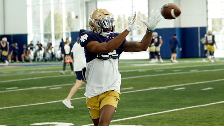 Notre Dame receiver Deion Colzie catches a pass during practice 