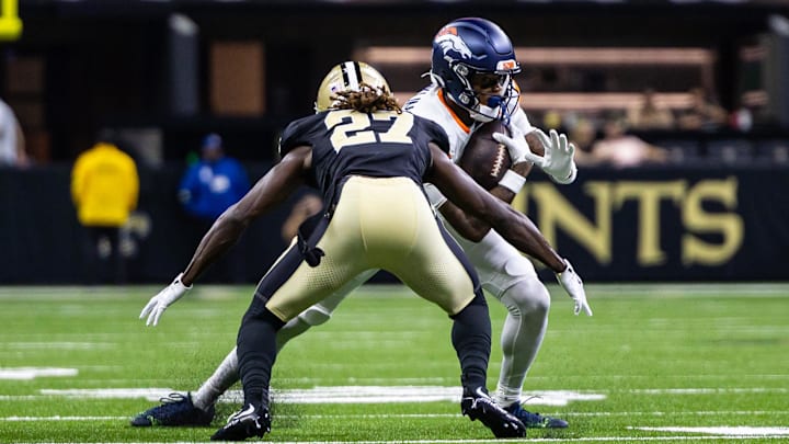 Aug 23, 2025; New Orleans, Louisiana, USA; New Orleans Saints cornerback Isaac Yiadom (27) misses a tackle against New Orleans Saints wide receiver Cedrick Wilson Jr. (11) during the first half at Caesars Superdome. Mandatory Credit: Stephen Lew-Imagn Images