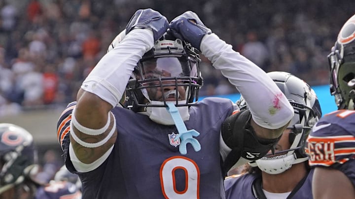 Sep 29, 2024; Chicago, Illinois, USA; Chicago Bears safety Jaquan Brisker (9) celebrates a defensive stop against the Los Angeles Rams during the second half at Soldier Field. Mandatory Credit: David Banks-Imagn Images