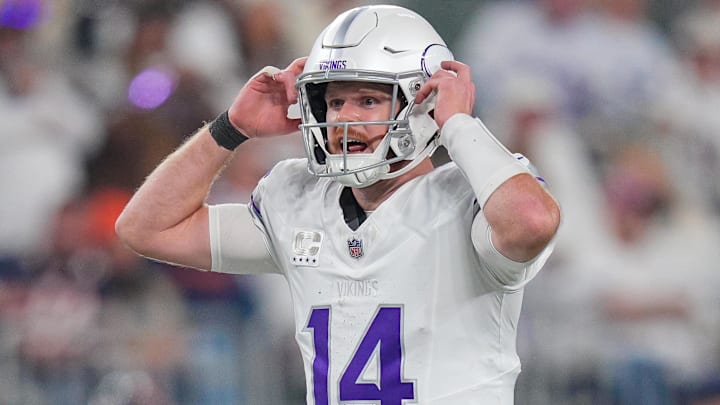 Minnesota Vikings quarterback Sam Darnold at the line of scrimmage against the Chicago Bears Minnesota Vikings quarterback Sam Darnold at the line of scrimmage against the Chicago Bears