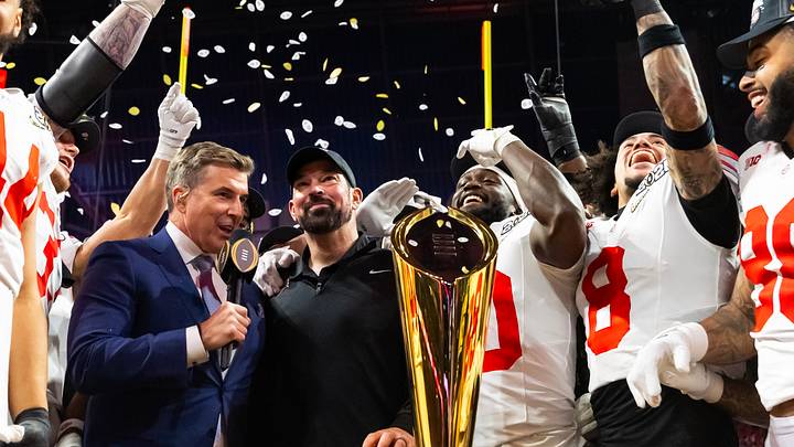 Jan 20, 2025; Atlanta, GA, USA; Announcer Rece Davis (left) interviews Ohio State Buckeyes head coach Ryan Day as he celebrates with his players after defeating the Notre Dame Fighting Irish during the CFP National Championship college football game at Mercedes-Benz Stadium. Mandatory Credit: Mark J. Rebilas-Imagn Images Jan 20, 2025; Atlanta, GA, USA; Announcer Rece Davis (left) interviews Ohio State Buckeyes head coach Ryan Day as he celebrates with his players after defeating the Notre Dame Fighting Irish during the CFP National Championship college football game at Mercedes-Benz Stadium. Mandatory Credit: Mark J. Rebilas-Imagn Images