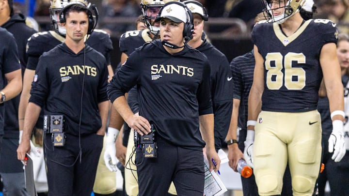 Aug 23, 2025; New Orleans, Louisiana, USA; New Orleans Saints head coach Kellen Moore looks on against the Denver Broncos during the second half at Caesars Superdome. Mandatory Credit: Stephen Lew-Imagn Images Aug 23, 2025; New Orleans, Louisiana, USA; New Orleans Saints head coach Kellen Moore looks on against the Denver Broncos during the second half at Caesars Superdome. Mandatory Credit: Stephen Lew-Imagn Images