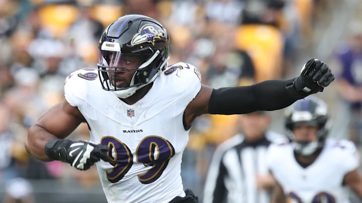 Nov 17, 2024; Pittsburgh, Pennsylvania, USA; Baltimore Ravens linebacker Odafe Oweh (99) pass rushes at the line of scrimmage  against the Pittsburgh Steelers during the second quarter at Acrisure Stadium. Mandatory Credit: Charles LeClaire-Imagn Images