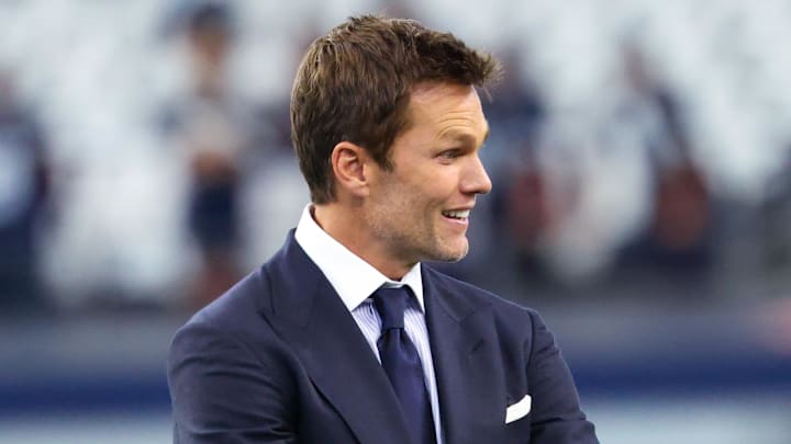 Sep 15, 2024; Arlington, Texas, USA;  Fox Sports commentator Tom Brady on the field before the game between the Dallas Cowboys and New Orleans Saints at AT&T Stadium.