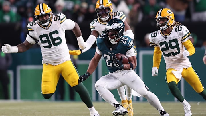 Philadelphia Eagles running back Saquon Barkley rushes the ball against the Green Bay Packers during their wild-card game.