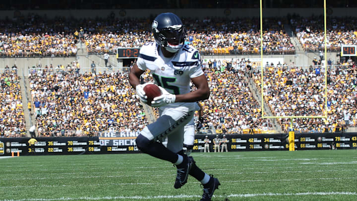 Sep 14, 2025; Pittsburgh, Pennsylvania, USA;  Seattle Seahawks wide receiver Tory Horton (15) runs into the end-zone to score on a twenty-one yard touchdown catch against the Pittsburgh Steelers during the first quarter at Acrisure Stadium. Mandatory Credit: Charles LeClaire-Imagn Images