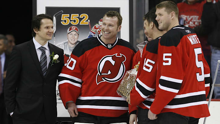 New Jersey Devils goalie Martin Brodeur (30) is honored for setting the NHL all-time wins record. Mandatory Credit: Ed Mulholland-Imagn Images