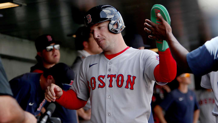 Sep 10, 2025; West Sacramento, California, USA; Boston Red Sox third baseman Alex Bregman (2) is congratulated by teammates after scoring a run against the Athletics during the third inning at Sutter Health Park. Mandatory Credit: Dennis Lee-Imagn Images