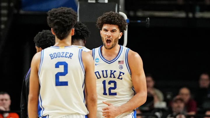 Duke forward Cameron Boozer reacts to a play with his brother, Cayden, during their second-round game against TCU in the NCAA men’s tournament. Duke forward Cameron Boozer reacts to a play with his brother, Cayden, during their second-round game against TCU in the NCAA men’s tournament.