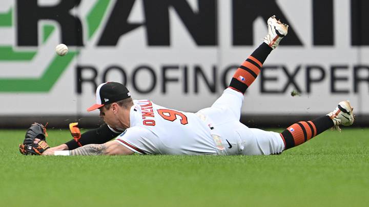 May 24, 2026; Baltimore, Maryland, USA;  Baltimore Orioles outfielder Tyler O'Neill (9) is unable to make a diving catch of a short fly ball in the sixth inning against the Detroit Tigers at Oriole Park at Camden Yards. Mandatory Credit: Jamie Sabau-Imagn Images