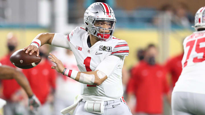 Jan 11, 2021; Miami Gardens, Florida, USA; Ohio State Buckeyes quarterback Justin Fields (1) against the Alabama Crimson Tide in the 2021 CFP National Championship Game. Mandatory Credit: Mark J. Rebilas-Imagn Images