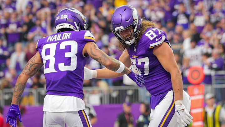 Nov 12, 2023; Minneapolis, Minnesota, USA; Minnesota Vikings tight end T.J. Hockenson (87) celebrates his touchdown with wide receiver Jalen Nailor (83) against the New Orleans Saints in the second quarter at U.S. Bank Stadium. Mandatory Credit: Brad Rempel-Imagn Images