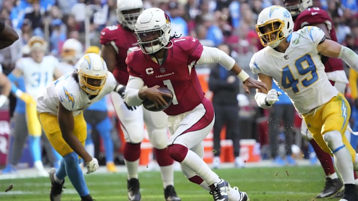 Nov 27, 2022; Glendale, AZ, USA; Arizona Cardinals quarterback Kyler Murray (1) scrambles away from Los Angeles Chargers linebacker Drue Tranquill (49) during the second quarter at State Farm Stadium. Mandatory Credit: Michael Chow-Imagn Images