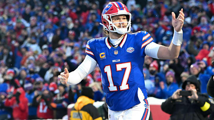 Buffalo Bills quarterback Josh Allen runs onto the field before the game against the New York Jets.