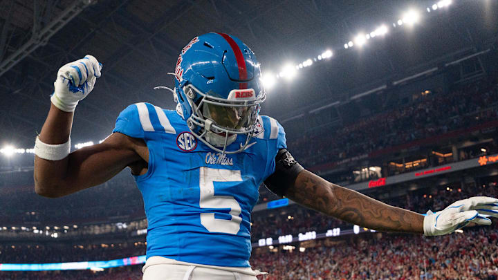 Ole Miss running back Kewan Lacy (5) celebrates after scoreing a touchdown during the CFP Fiesta Bowl against Miami at the State Farm Stadium, in Glendale, Ariz., on Thursday, Jan. 8, 2026.