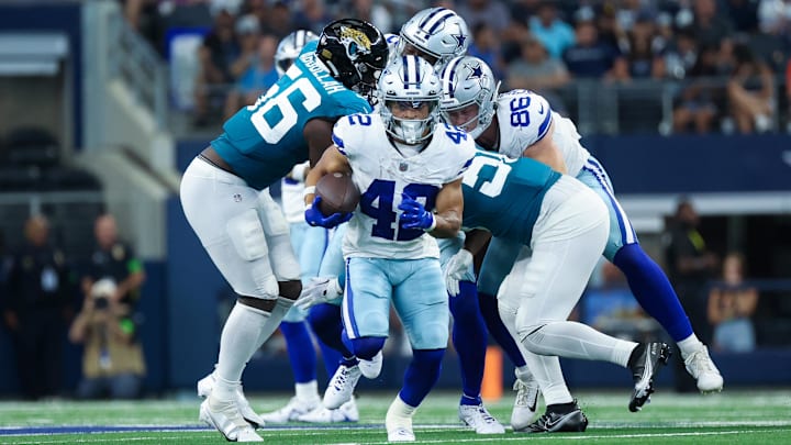 Dallas Cowboys running back Deuce Vaughn (42) runs for yardage during the second half against the Jacksonville Jaguars at AT&T Stadium.