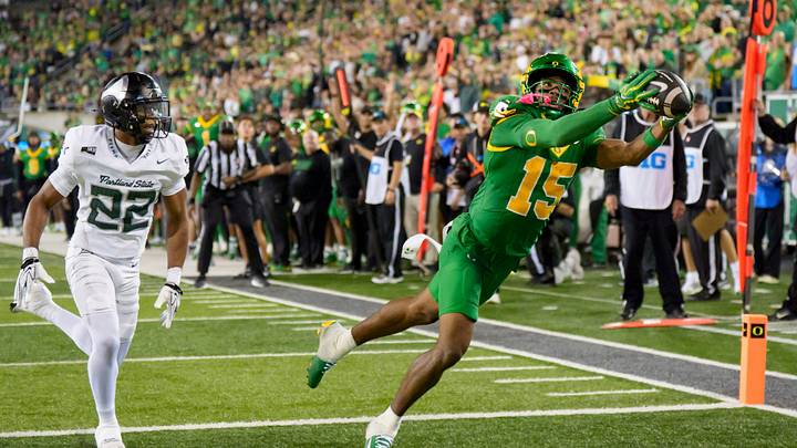 Oregon wide receiver Messiah Hampton hauls in a touchdown under cover from Portland State cornerback DaMari Washington as the Oregon Ducks host the Portland State Vikings on Sept. 18, 2026, at Autzen Stadium in Eugene, Oregon.