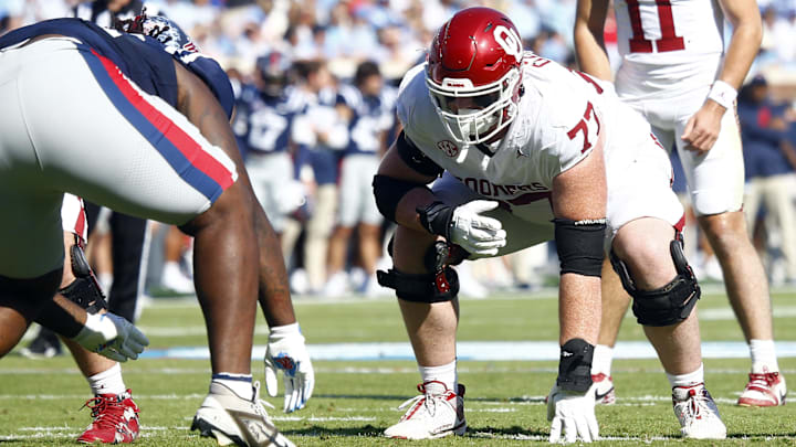 Oct 26, 2024; Oxford, Mississippi, USA; Oklahoma Sooners offensive lineman Heath Ozaeta (77) waits for the snap during the first half against the Mississippi Rebels at Vaught-Hemingway Stadium. Mandatory Credit: Petre Thomas-Imagn Images
