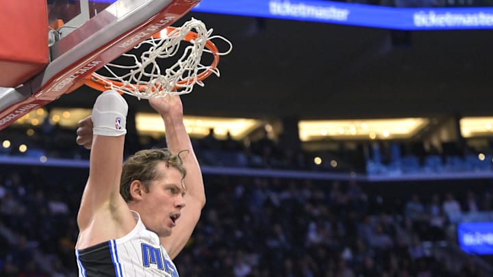 Nov 20, 2024; Inglewood, California, USA;  Orlando Magic center Moritz Wagner (21) dunks past Los Angeles Clippers center Mo Bamba (4) in the second half at Intuit Dome. Mandatory Credit: Jayne Kamin-Oncea-Imagn Images