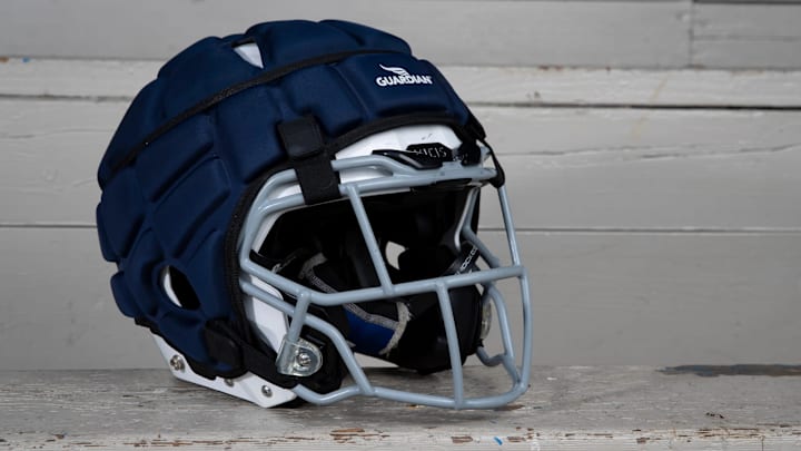 A Guardian Cap adorns a helmet at Pleasant Hill High School in Oregon.