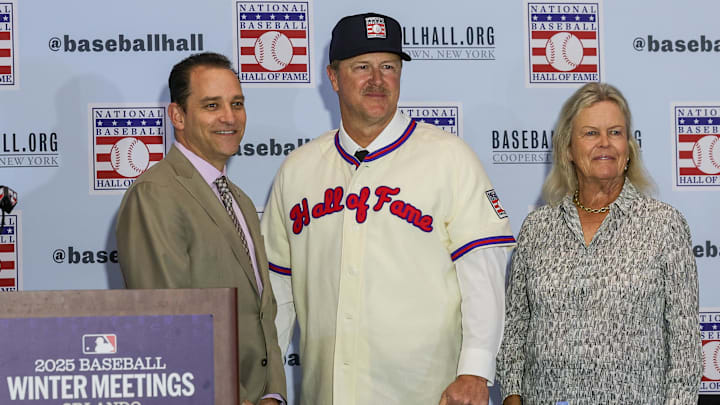 Hall of Fame inductee Jeff Kent poses for a picture along with Hall of Fame President Josh Rawitch and Chairman of the Board Jane Forbes Clark during the 2025 MLB Winter Meetings at Signia by Hilton Hotel. 