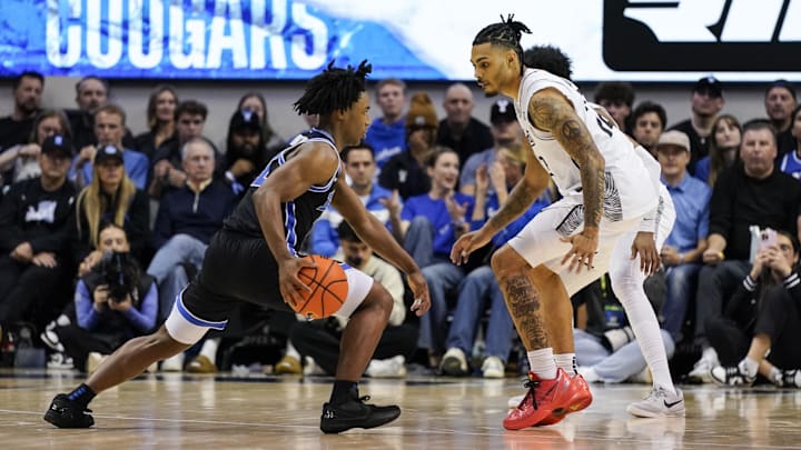 Feb 24, 2026; Provo, Utah, USA; BYU Cougars guard Robert Wright III (1) controls the ball during the second half against the UCF Knights at Marriott Center. Mandatory Credit: Aaron Baker-Imagn Images Feb 24, 2026; Provo, Utah, USA; BYU Cougars guard Robert Wright III (1) controls the ball during the second half against the UCF Knights at Marriott Center. Mandatory Credit: Aaron Baker-Imagn Images