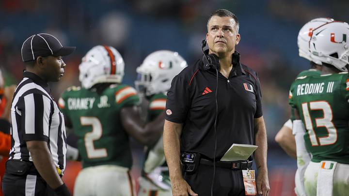 Sep 14, 2023; Miami Gardens, Florida, USA; Miami Hurricanes head coach Mario Cristobal looks on from the field against the Bethune Cookman Wildcats during the second quarter at Hard Rock Stadium. Mandatory Credit: Sam Navarro-Imagn Images