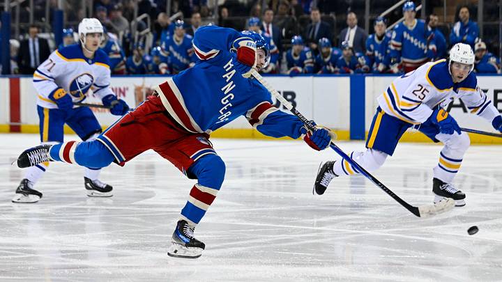 Apr 8, 2026; New York, New York, USA; New York Rangers left wing Alexis Lafrenière (13) shoots and scores his second goal of the gmae against the Buffalo Sabres during the second period at Madison Square Garden. Mandatory Credit: Dennis Schneidler-Imagn Images