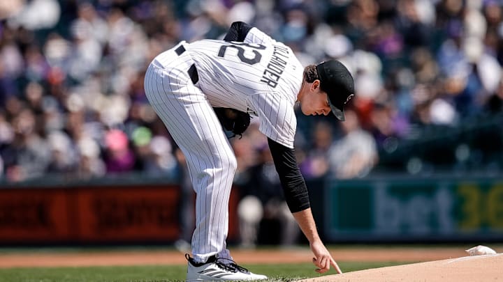 Apr 6, 2025; Denver, Colorado, USA; Colorado Rockies starting pitcher Chase Dollander (32) draws into the dirt before taking the mound against the Athletics at Coors Field. Mandatory Credit: Isaiah J. Downing-Imagn Images Apr 6, 2025; Denver, Colorado, USA; Colorado Rockies starting pitcher Chase Dollander (32) draws into the dirt before taking the mound against the Athletics at Coors Field. Mandatory Credit: Isaiah J. Downing-Imagn Images