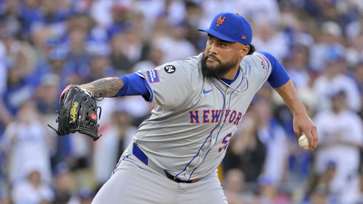 Los Angeles, California, USA; New York Mets pitcher Sean Manaea (59) pitches against the Los Angeles Dodgers in the first inning during Game 6 of the NLCS for the 2024 MLB playoffs at Dodger Stadium.