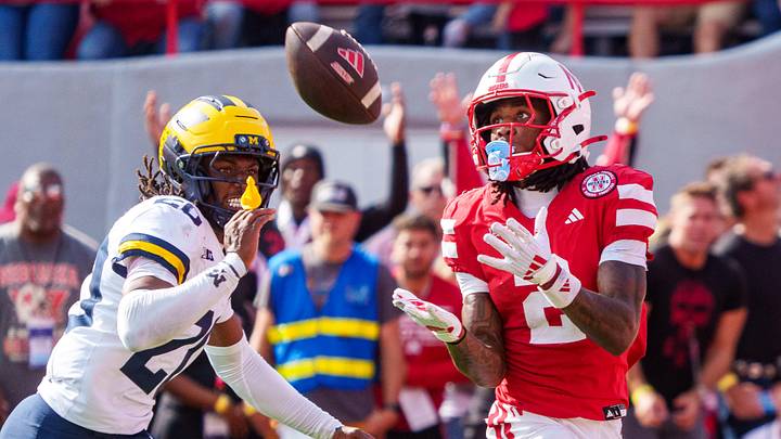 Jacory Barney Jr. catches a pass for a touchdown against Michigan. Jacory Barney Jr. catches a pass for a touchdown against Michigan.