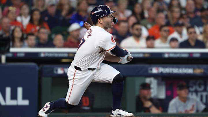 Oct 1, 2024; Houston, Texas, USA; Houston Astros second base Jose Altuve (27) hits a single in the third inning against the Detroit Tigers in game one of the Wild Card round for the 2024 MLB Playoffs at Minute Maid Park. Oct 1, 2024; Houston, Texas, USA; Houston Astros second base Jose Altuve (27) hits a single in the third inning against the Detroit Tigers in game one of the Wild Card round for the 2024 MLB Playoffs at Minute Maid Park.