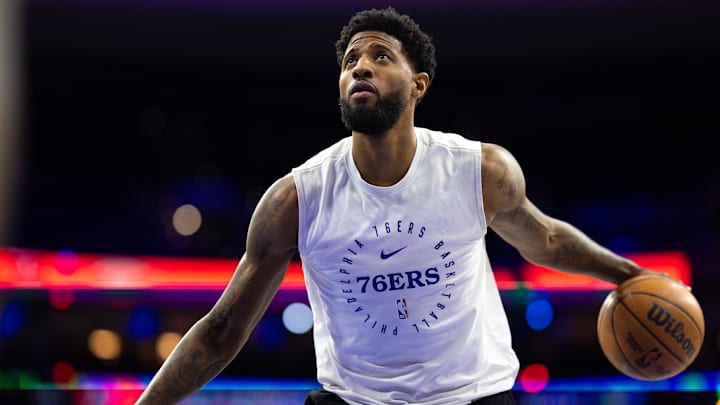 Jan 10, 2025; Philadelphia, Pennsylvania, USA; Philadelphia 76ers forward Paul George warms up before action against the New Orleans Pelicans at Wells Fargo Center. Mandatory Credit: Bill Streicher-Imagn Images