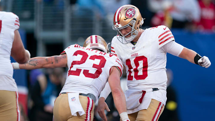 San Francisco 49ers quarterback Mac Jones (10) celebrates with San Francisco 49ers running back Christian McCaffrey (23) after scoring a touchdown during a week 9 game between New York Giants and San Francisco 49ers at MetLife Stadium on Sunday, Nov. 2, 2025.