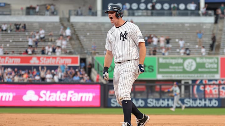 Aug 4, 2024; Bronx, New York, USA; New York Yankees third baseman DJ LeMahieu (26) celebrates after hitting a game-winning RBI singe during the tenth inning against the Toronto Blue Jays at Yankee Stadium. Aug 4, 2024; Bronx, New York, USA; New York Yankees third baseman DJ LeMahieu (26) celebrates after hitting a game-winning RBI singe during the tenth inning against the Toronto Blue Jays at Yankee Stadium.