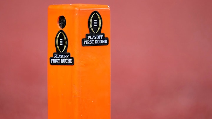 A pylon features College Football Playoff logos