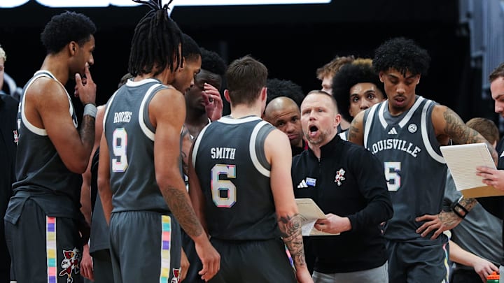 Louisville basketball coach Pat Kelsey instructs his team during a timeout against Wake Forest in their game at the KFC Yum! Center in Louisville, Ky. on Jan. 28, 2025