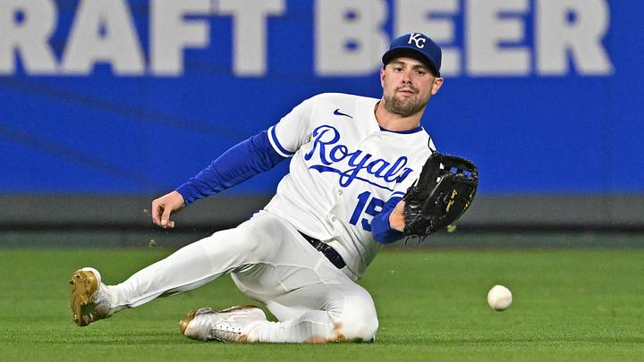 May 19, 2026; Kansas City, Missouri, USA;  Kansas City Royals center fielder Lane Thomas (15) miss plays a fly ball in the ninth inning against the Boston Red Sox at Kauffman Stadium. Mandatory Credit: Peter Aiken-Imagn Images