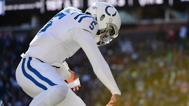 Dec 1, 2024; Foxborough, Massachusetts, USA;  Indianapolis Colts quarterback Anthony Richardson (5) spikes the ball after scoring a touchdown during the first half against the New England Patriots at Gillette Stadium. Mandatory Credit: Bob DeChiara-Imagn Images