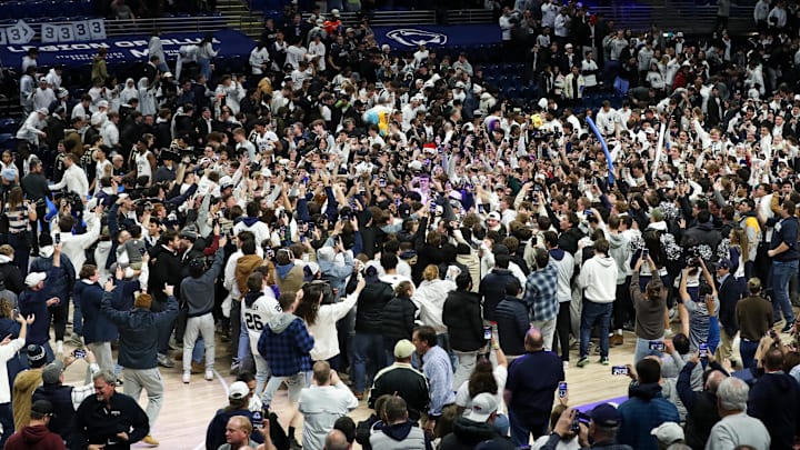 Penn State students and fans storm the court after the Penn State Nittany Lions upset the Purdue Boilermakers at Bryce Jordan Center. 