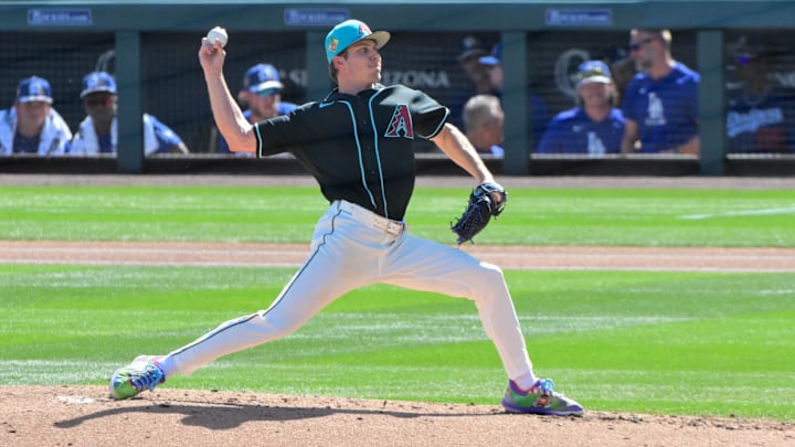 Feb 25, 2026; Salt River Pima-Maricopa, Arizona, USA; Arizona Diamondbacks pitcher Drey Jameson (99) throws in the second inning against the Los Angeles Dodgers at Salt River Fields at Talking Stick. Mandatory Credit: Matt Kartozian-Imagn Images