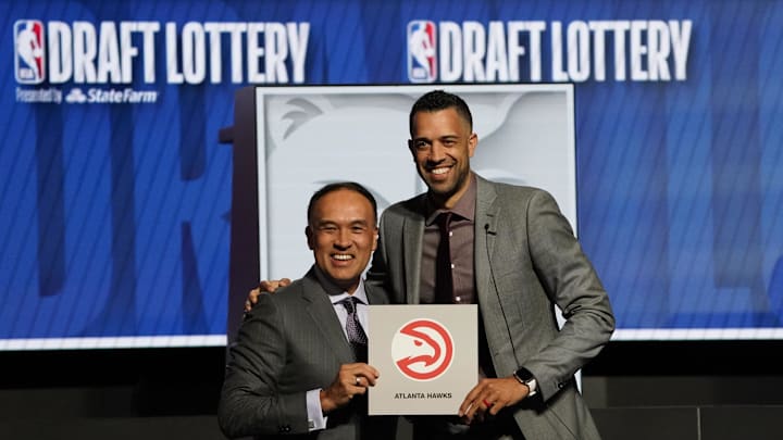 Atlanta Hawks general manager Landry Fields (right) and Deputy NBA Commissioner Mark Tatum