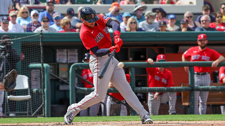 Feb 27, 2025; Lakeland, Florida, USA; Boston Red Sox center fielder Trayce Thompson (37) hits a double during the fifth inning against the Detroit Tigers at Publix Field at Joker Marchant Stadium. Mandatory Credit: Mike Watters-Imagn Images Feb 27, 2025; Lakeland, Florida, USA; Boston Red Sox center fielder Trayce Thompson (37) hits a double during the fifth inning against the Detroit Tigers at Publix Field at Joker Marchant Stadium. Mandatory Credit: Mike Watters-Imagn Images
