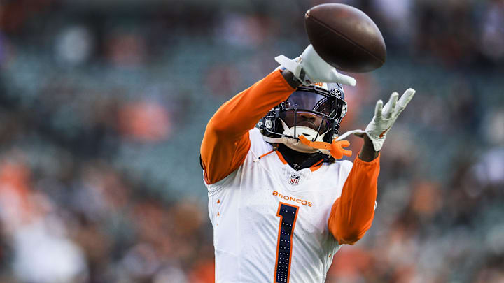 Dec 28, 2024; Cincinnati, Ohio, USA; Denver Broncos cornerback Tremon Smith (1) catches a pass during warmups before the game against the Cincinnati Bengals at Paycor Stadium. Dec 28, 2024; Cincinnati, Ohio, USA; Denver Broncos cornerback Tremon Smith (1) catches a pass during warmups before the game against the Cincinnati Bengals at Paycor Stadium.