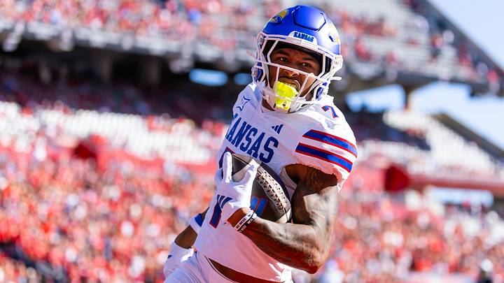 Nov 8, 2025; Tucson, Arizona, USA; Kansas Jayhawks wide receiver Cam Pickett (7) against the Arizona Wildcats at Arizona Stadium. Mandatory Credit: Mark J. Rebilas-Imagn Images Nov 8, 2025; Tucson, Arizona, USA; Kansas Jayhawks wide receiver Cam Pickett (7) against the Arizona Wildcats at Arizona Stadium. Mandatory Credit: Mark J. Rebilas-Imagn Images