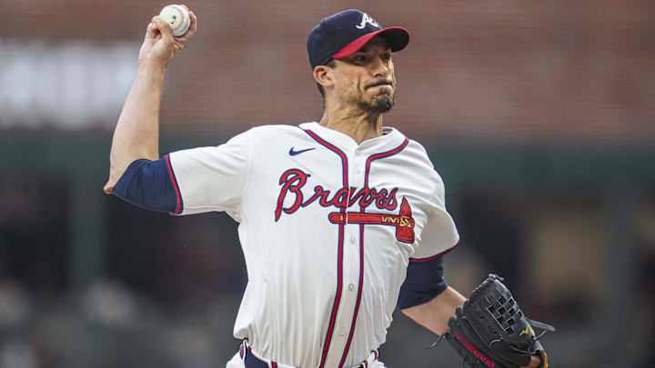 Sep 4, 2024; Cumberland, Georgia, USA; Atlanta Braves pitcher Charlie Morton (50) pitches against the Colorado Rockies during the first inning at Truist Park